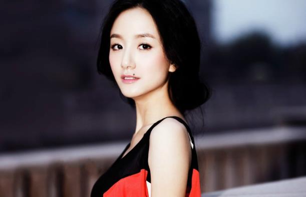 李倩为什么把痣点了,李倩嘴角的痣叫什么痣