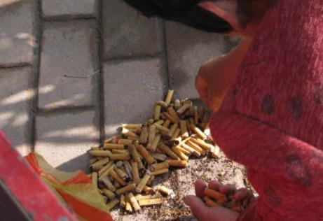 变废为宝?烟头可用于铺路 环保还降温(图) 变废为宝?烟头可用于铺路 环保还降温(图)