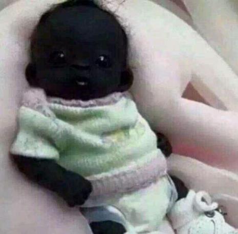 南非小孩世界上最黑的孩子：像黑色洋娃娃（图）