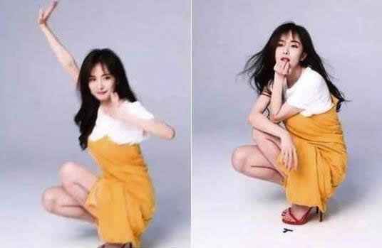 杨幂蹲地摆撩人姿势：撩发捧脸笑的好甜（图）