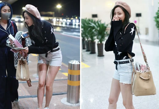 张天爱甜笑显娇羞：遇粉丝送花有礼貌（图）