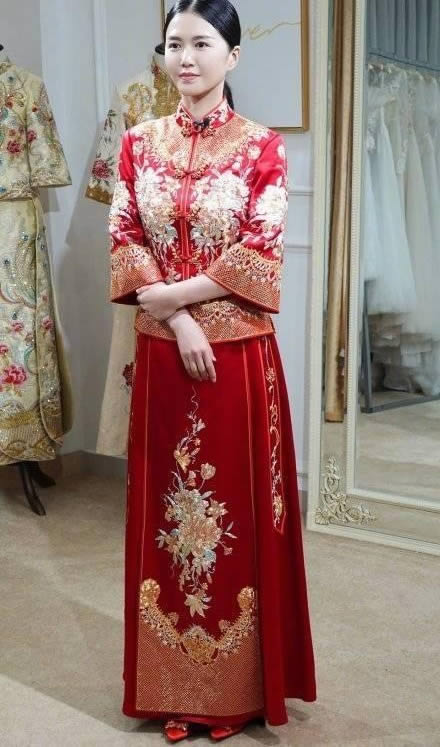 谭维维试婚纱图片曝光：一袭白色婚纱幸福浅笑（图）