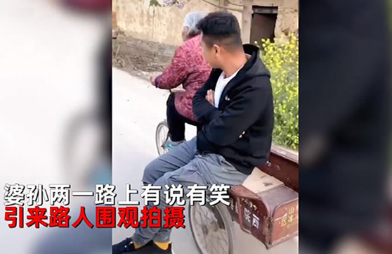 92岁奶奶骑三轮带30岁孙子兜风 不服老的人永远年轻 92岁奶奶骑三轮带30岁孙子兜风 不服老的人永远年轻