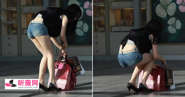 路遇一清纯美女弯腰一瞬间捡起掉落物品（图）