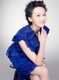 练束梅